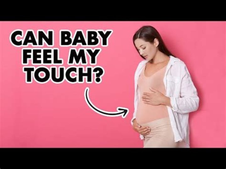 Can my baby feel when I touch my belly?