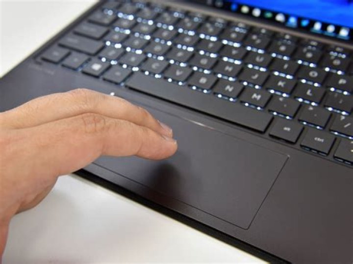 How do I enable Touchpad scrolling on my Dell laptop Windows 7?