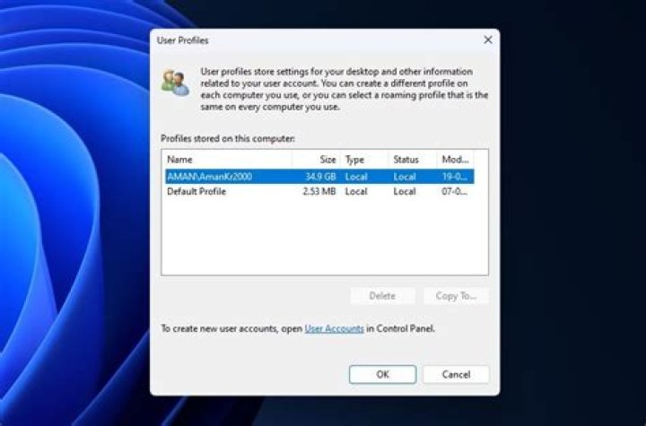 How do I repair a damaged user profile in Windows XP?
