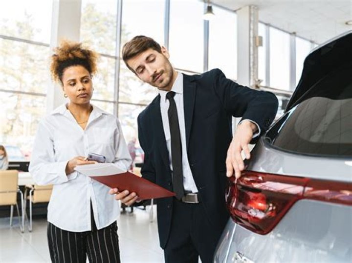 How do I sell my car to a dealership?