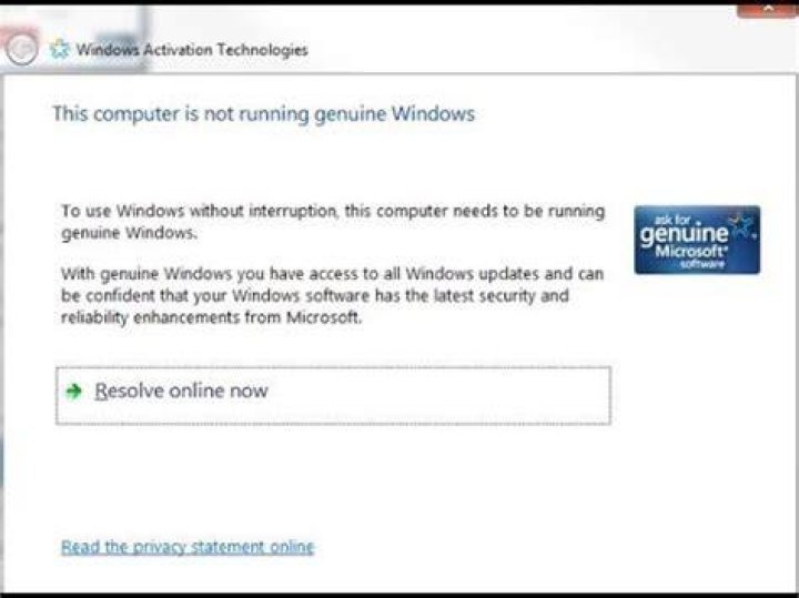 How do I stop this computer is not running genuine Windows message?