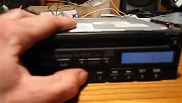 How do I unlock my Mitsubishi radio code?