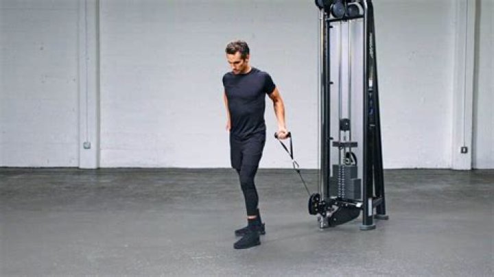 How do you curl a standing cable?