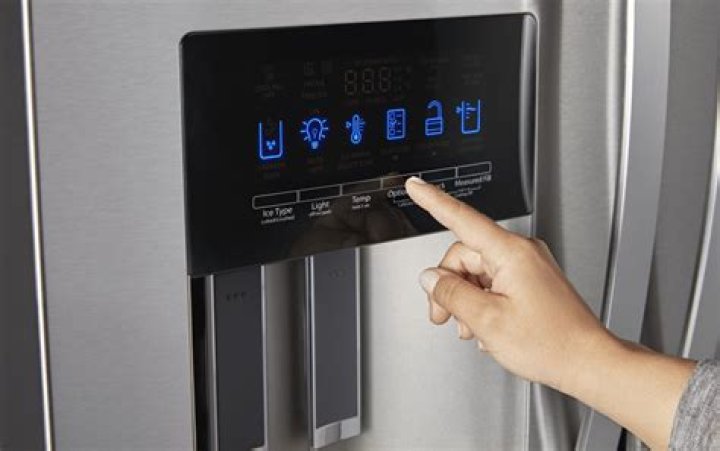 How do you reset a GE side by side refrigerator?