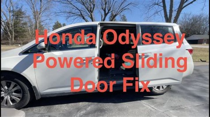 How do you reset a sliding door on a 2001 Honda Odyssey?