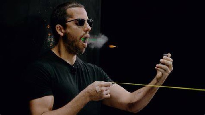 How does David Blaine do the bullet trick?
