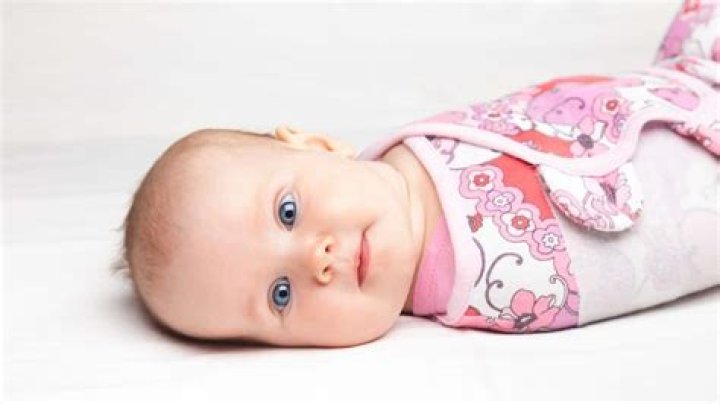 What if my baby rolls over while swaddled?