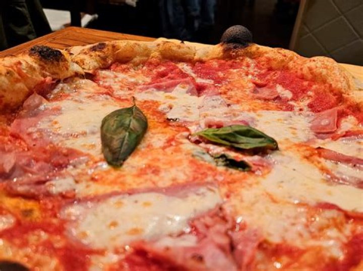 What is Piola pizzeria?