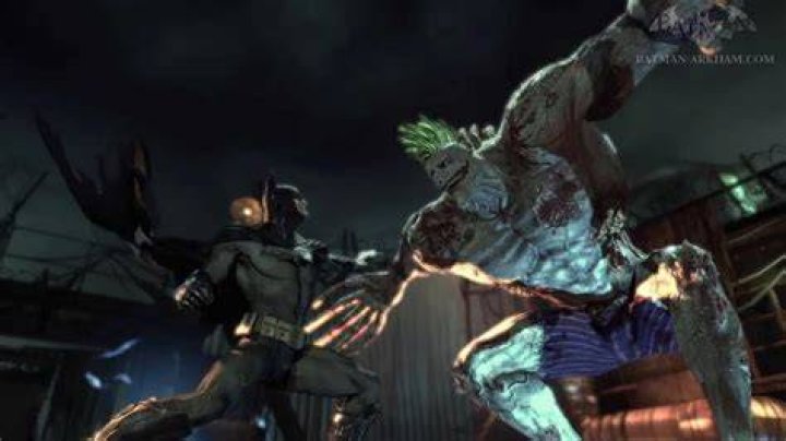 Who grabs the Titan in Arkham Asylum?