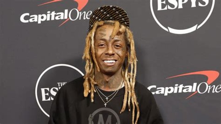Why did Lil Wayne change his name?